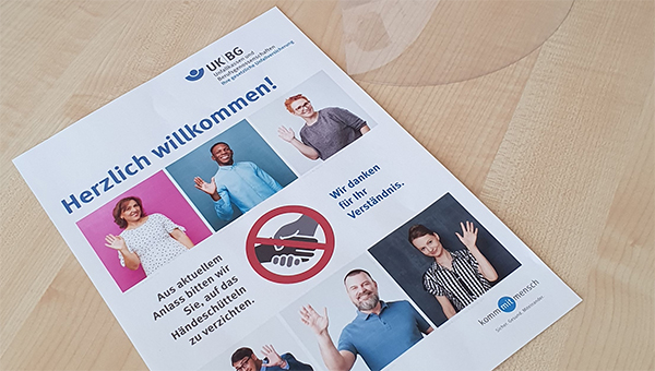 Bild mit einer Broschüre mit Schutzmaßnahmen.
